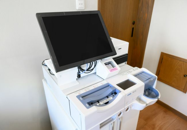 自動釣り銭機
